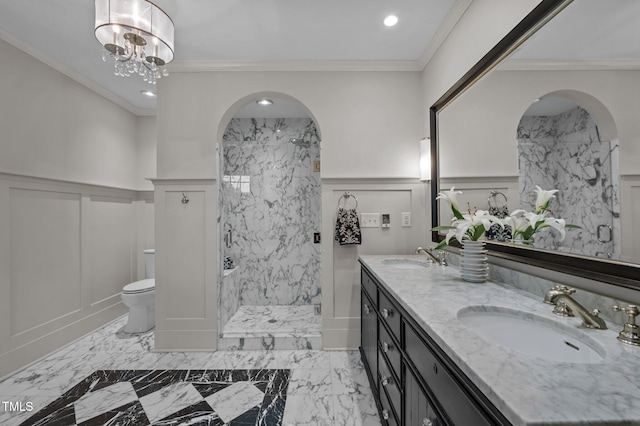 1015 Watts St, Durham, NC 27701 - bathroom featuring a decorative wall, a marble finish shower, toilet, a wainscoted wall, and marble tiled floors