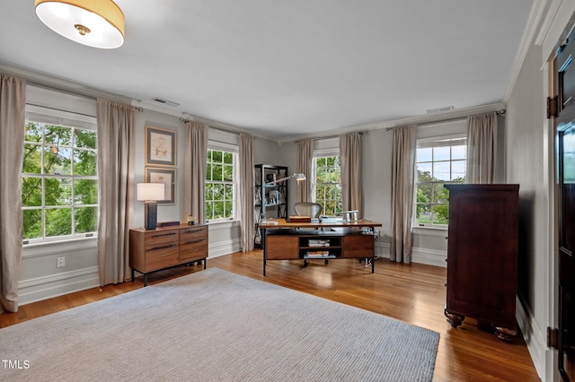 1015 Watts St, Durham, NC 27701 - office with ornamental molding, baseboards, and wood finished floors