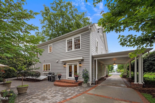 1015 Watts St, Durham, NC 27701 - view of front facade with french doors and a patio area