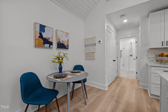 1015 Watts St, Durham, NC 27701 - dining area featuring light wood-type flooring and baseboards