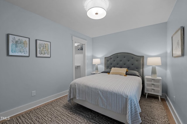 1015 Watts St, Durham, NC 27701 - bedroom featuring wood finished floors and baseboards