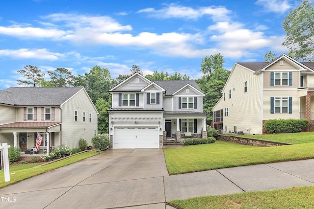 craftsman house with covered porch, driveway, a front lawn, an attached garage, and stone siding