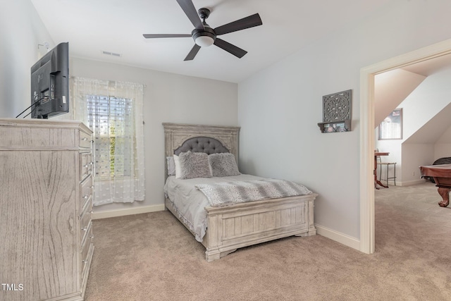 carpeted bedroom with baseboards and ceiling fan