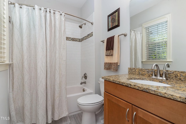 full bathroom featuring toilet, vanity, shower / bath combo, and wood finished floors