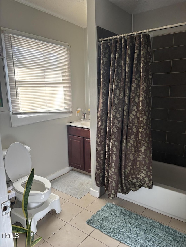 208 E Geer St, Durham, NC 27701 - full bathroom featuring tile patterned flooring, toilet, shower / bath combo, and vanity