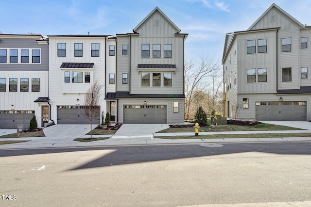 4611 Mint Leaf Ln, Raleigh, NC 27612 - townhome / multi-family property featuring board and batten siding, concrete driveway, a garage, and central air condition unit