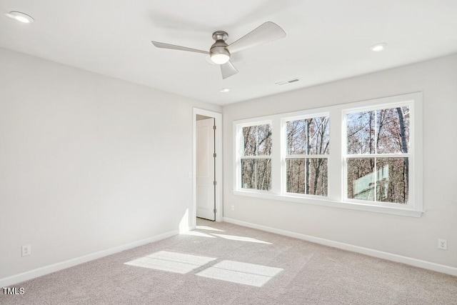 4611 Mint Leaf Ln, Raleigh, NC 27612 - unfurnished room with a ceiling fan, baseboards, light carpet, plenty of natural light, and recessed lighting