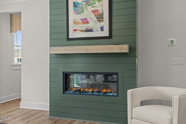 4611 Mint Leaf Ln, Raleigh, NC 27612 - detailed view of a large fireplace and wood finished floors