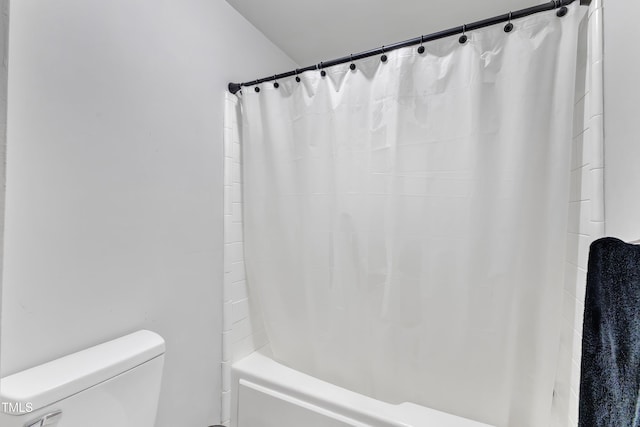 full bathroom with toilet and shower / tub combo