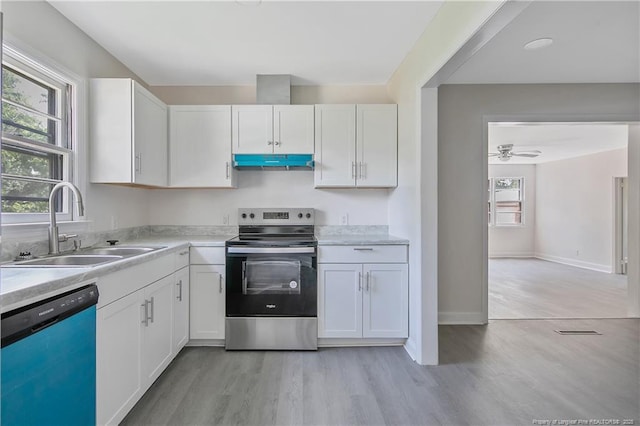 kitchen with dishwashing machine, stainless steel electric stove, a sink, under cabinet range hood, and light wood-style floors