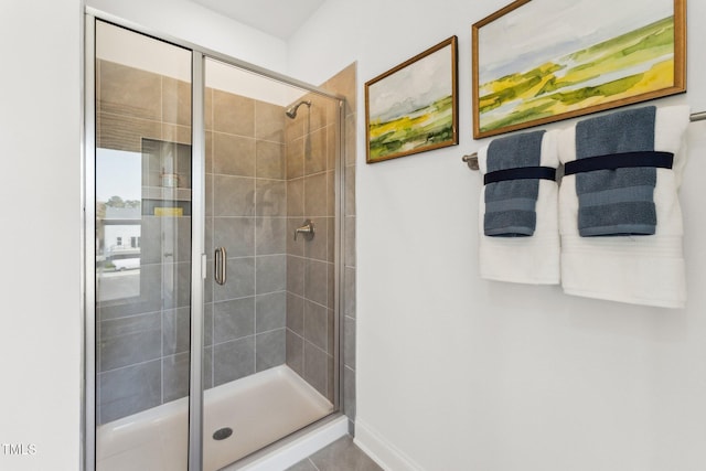 bathroom featuring a shower stall
