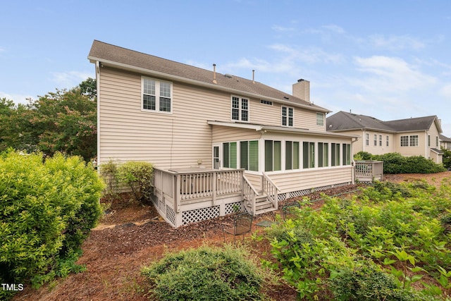 111 Gingergate Dr, Cary, NC 27519 - rear view of property with a sunroom, a chimney, a wooden deck, and central AC