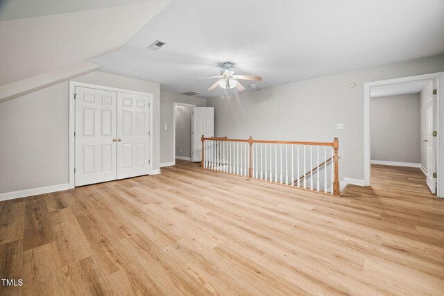 111 Gingergate Dr, Cary, NC 27519 - bonus room with wood finished floors, a ceiling fan, and baseboards