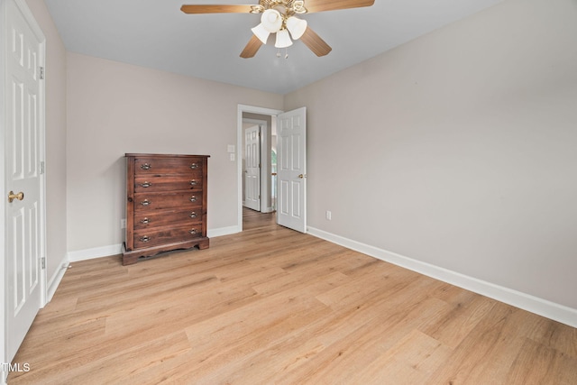 111 Gingergate Dr, Cary, NC 27519 - unfurnished bedroom with baseboards, wood finished floors, and a ceiling fan