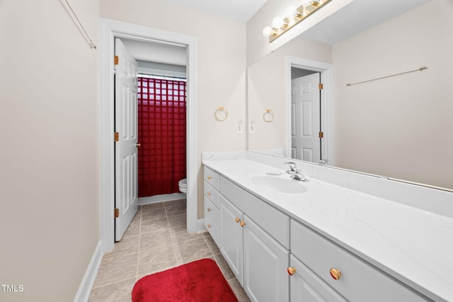 111 Gingergate Dr, Cary, NC 27519 - full bath with toilet, vanity, baseboards, tile patterned flooring, and a shower with shower curtain