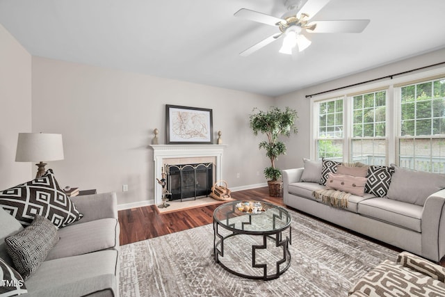 111 Gingergate Dr, Cary, NC 27519 - living area with wood finished floors, ceiling fan, and a tile fireplace