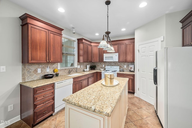 111 Gingergate Dr, Cary, NC 27519 - kitchen featuring white appliances, a kitchen island, backsplash, hanging light fixtures, and recessed lighting