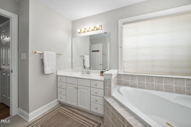 111 Gingergate Dr, Cary, NC 27519 - bathroom with a bath and vanity