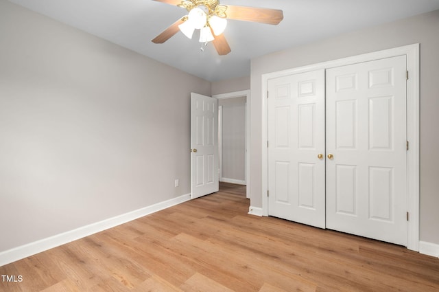 111 Gingergate Dr, Cary, NC 27519 - unfurnished bedroom featuring light wood-type flooring, a closet, and a ceiling fan