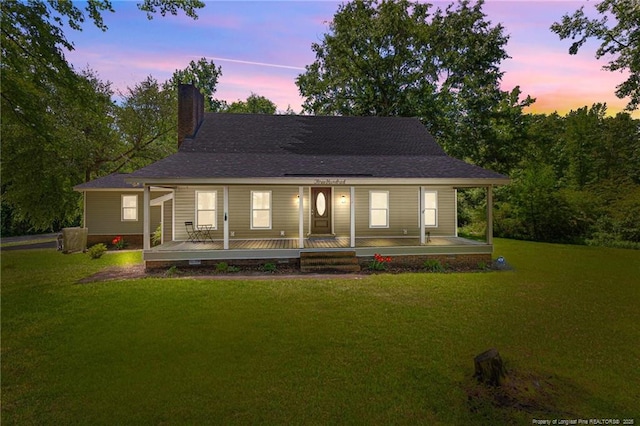 300 Fox Ridge Rd, Warsaw, NC 28398 - back of house with a porch, a chimney, and a yard