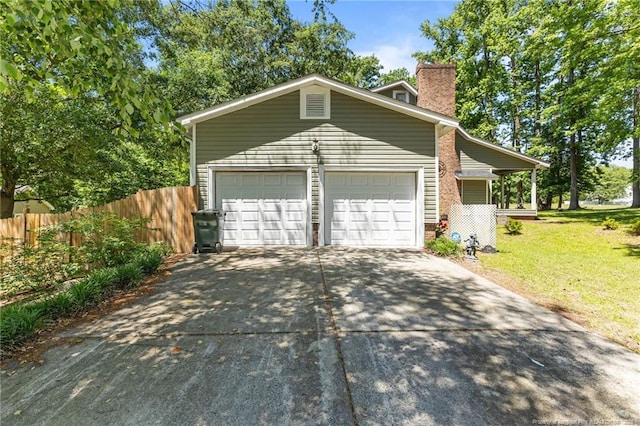 300 Fox Ridge Rd, Warsaw, NC 28398 - garage featuring driveway