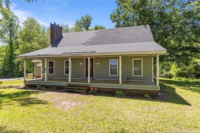 300 Fox Ridge Rd, Warsaw, NC 28398 - country-style home with covered porch, a chimney, and a front yard