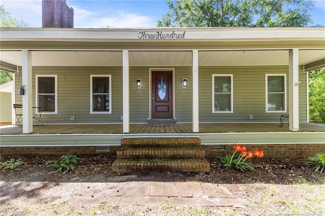 300 Fox Ridge Rd, Warsaw, NC 28398 - view of front facade featuring a porch and a chimney