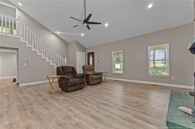 300 Fox Ridge Rd, Warsaw, NC 28398 - living area with a ceiling fan, light wood-style floors, recessed lighting, high vaulted ceiling, and stairway