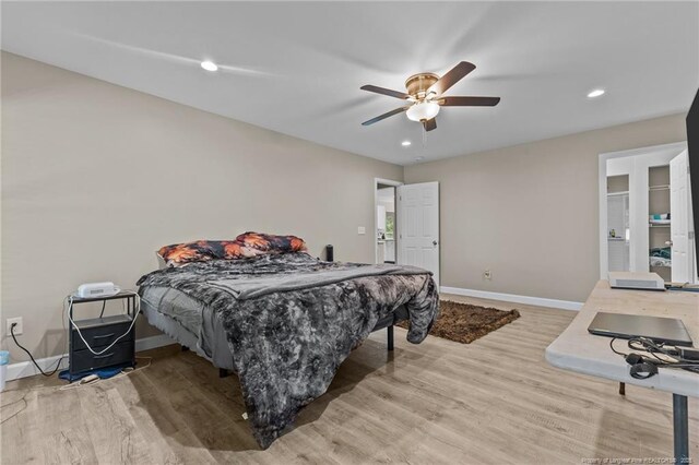 300 Fox Ridge Rd, Warsaw, NC 28398 - bedroom featuring wood finished floors, baseboards, recessed lighting, and ceiling fan
