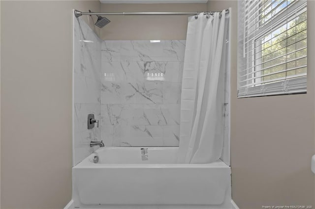 300 Fox Ridge Rd, Warsaw, NC 28398 - bathroom featuring shower / bath combo with shower curtain and baseboards