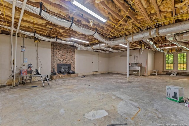 300 Fox Ridge Rd, Warsaw, NC 28398 - basement with a sink and a wood stove