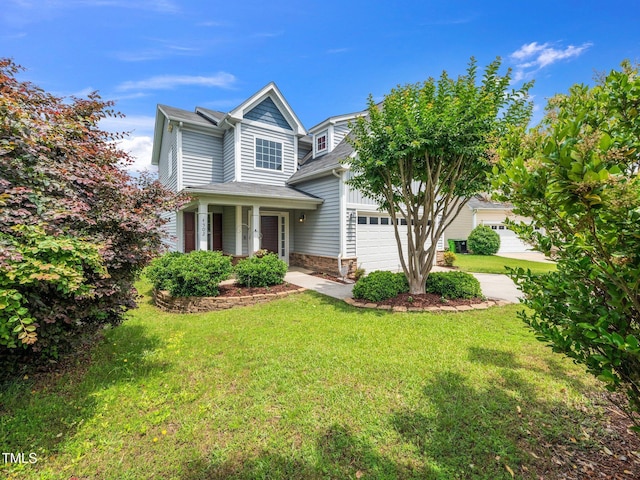 4502 Joe Cotton Dr, Knightdale, NC 27545 - view of front facade featuring a front lawn, driveway, and an attached garage