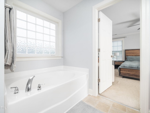 4502 Joe Cotton Dr, Knightdale, NC 27545 - full bathroom with a bath, connected bathroom, and baseboards