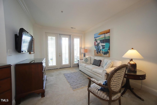 2901 Market Bridge Ln Unit 203, Raleigh, NC 27608 - living room featuring crown molding, light colored carpet, and baseboards