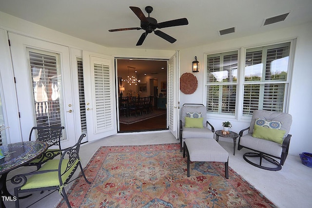 2901 Market Bridge Ln Unit 203, Raleigh, NC 27608 - view of patio / terrace featuring a ceiling fan and french doors