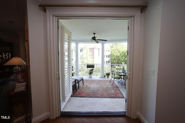 2901 Market Bridge Ln Unit 203, Raleigh, NC 27608 - doorway with ceiling fan, baseboards, and wood finished floors