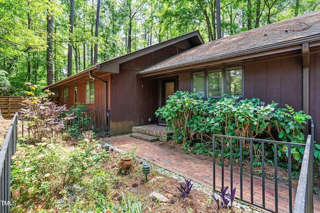 1608 New Hill Olive Chapel Rd, Apex, NC 27502 - view of exterior entry with fence