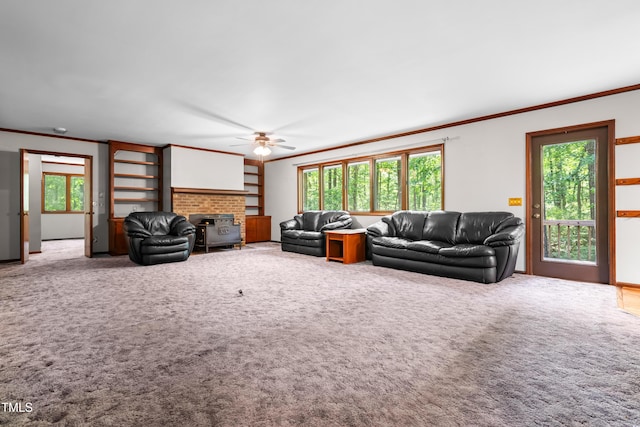 1608 New Hill Olive Chapel Rd, Apex, NC 27502 - living room featuring ornamental molding, a ceiling fan, plenty of natural light, and carpet floors