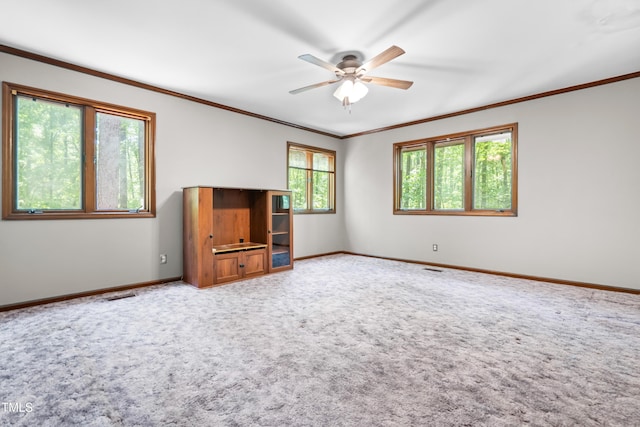 1608 New Hill Olive Chapel Rd, Apex, NC 27502 - carpeted empty room with a ceiling fan, ornamental molding, and baseboards