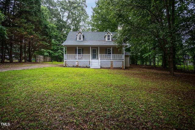 129 Clark Ct, Youngsville, NC 27596 - new england style home with a porch and a front yard