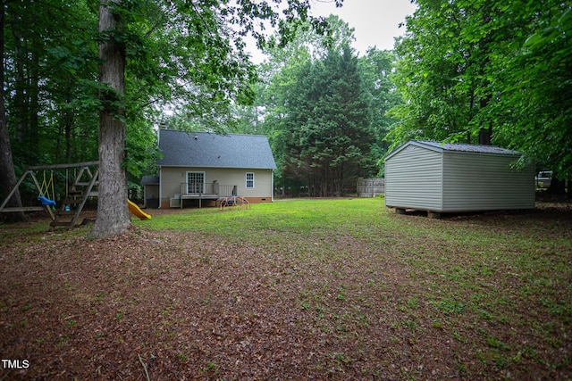 129 Clark Ct, Youngsville, NC 27596 - view of grassy yard featuring a wooden deck