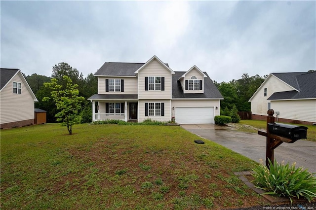 109 Sand Dollar Ct, Raeford, NC 28376 - traditional home with covered porch, driveway, and a front lawn