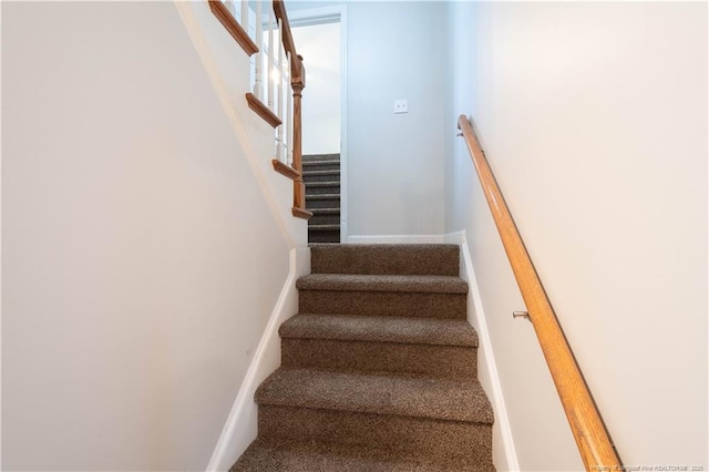 109 Sand Dollar Ct, Raeford, NC 28376 - stairs featuring baseboards