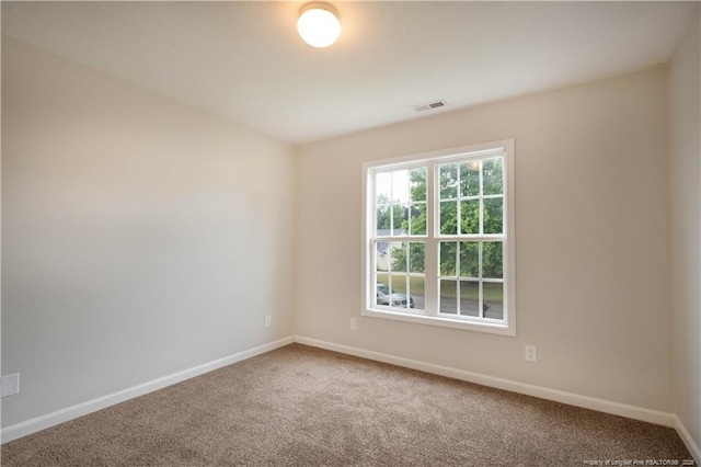 109 Sand Dollar Ct, Raeford, NC 28376 - spare room featuring carpet flooring and baseboards