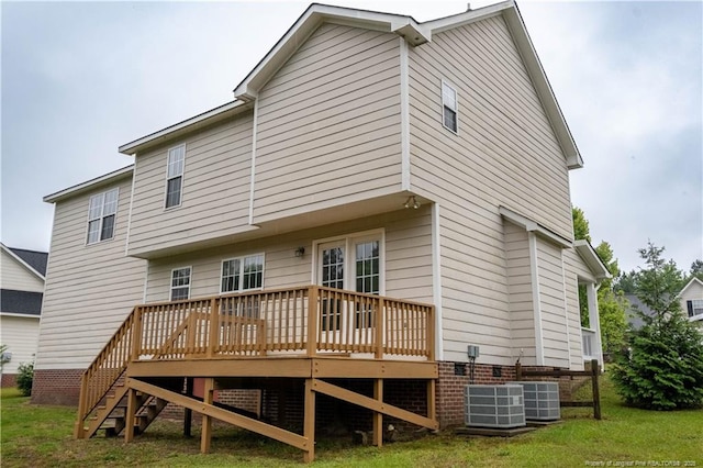 109 Sand Dollar Ct, Raeford, NC 28376 - rear view of property with a deck, a lawn, and central AC