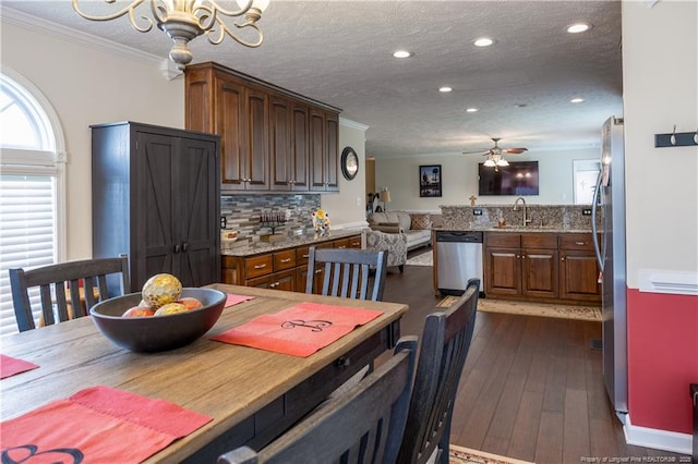 430 Rose Rd, Newton Grove, NC 28366 - dining area featuring ornamental molding, dark wood-style flooring, ceiling fan, recessed lighting, and a textured ceiling