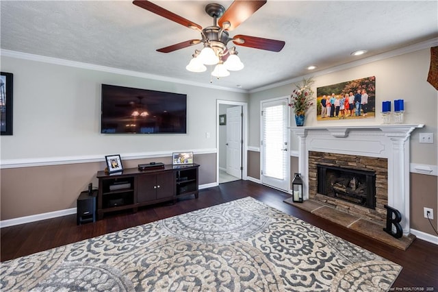 430 Rose Rd, Newton Grove, NC 28366 - living area featuring baseboards, a ceiling fan, wood finished floors, a stone fireplace, and recessed lighting