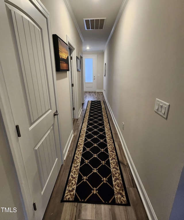 400 Access Dr, Youngsville, NC 27596 - hallway featuring crown molding, dark wood-type flooring, and baseboards