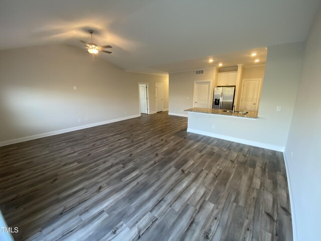 400 Access Dr, Youngsville, NC 27596 - unfurnished living room with a ceiling fan, dark wood-style floors, baseboards, recessed lighting, and vaulted ceiling