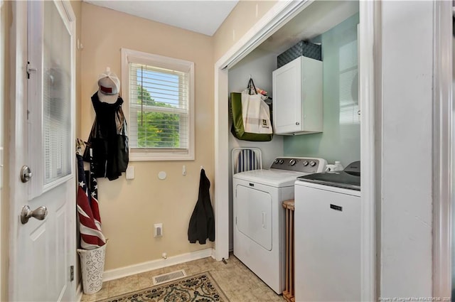 1501 E 6th St, Lumberton, NC 28358 - washroom with cabinet space, washing machine and clothes dryer, and baseboards